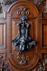 Vienna, Austria. Old beautiful wooden carved door from the 1800s. Art Print